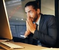 Person-folded-hands-computer